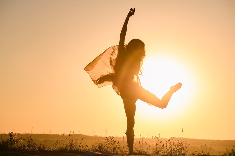 Woman practicing yoga outdoors